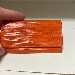Authentic Louis Vuitton orange key holder